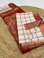 Red and white checkered fabric on a textured surface