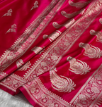 pink fabric with intricate white patterns