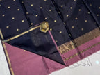 Navy blue fabric with gold and brown border on a white background