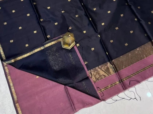 Navy blue fabric with gold and brown border on a white background