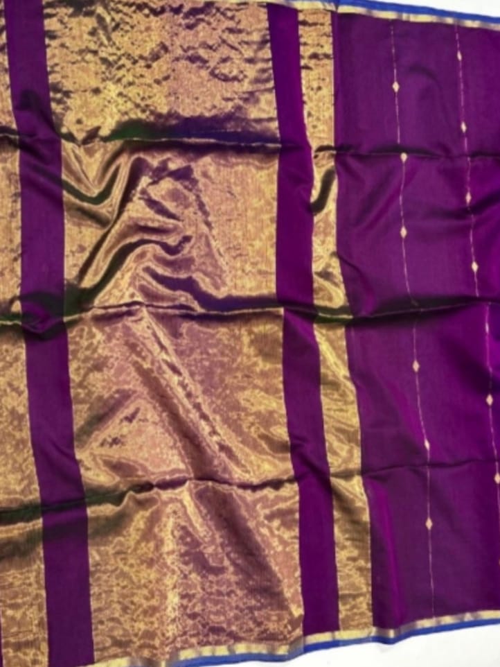 Purple and gold fabric with a textured pattern
