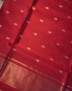 Red fabric with gold floral patterns