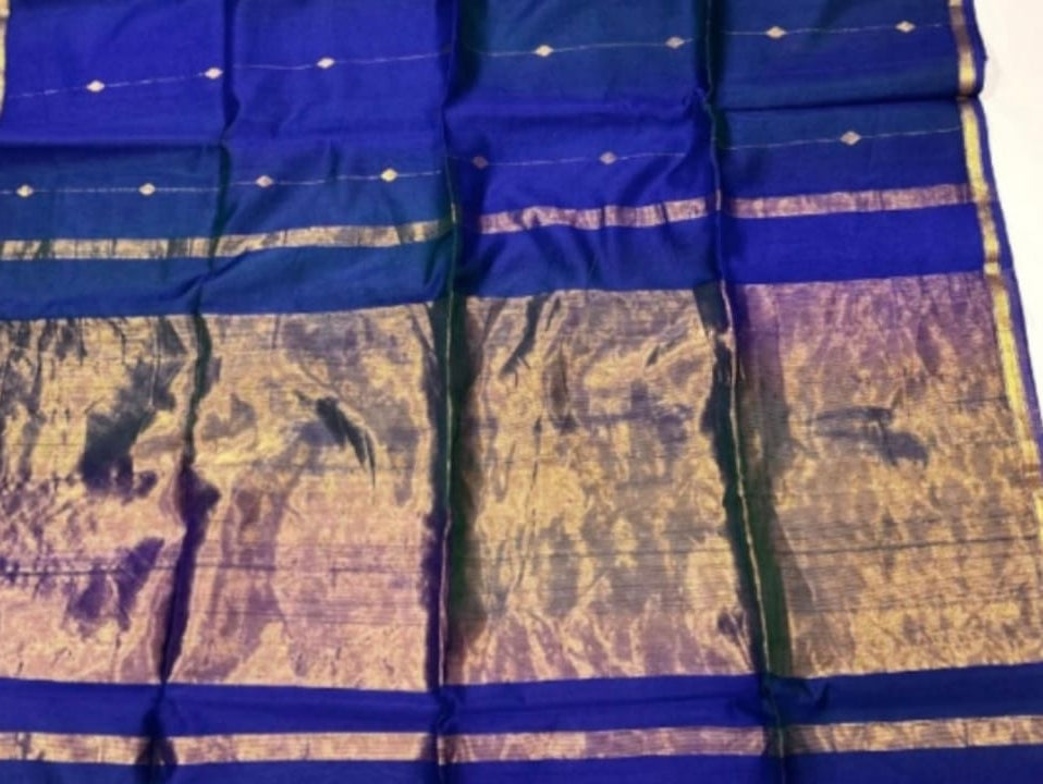 Blue and gold traditional fabric with a pattern