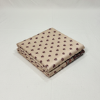 Folded fabric with a pattern on a white background