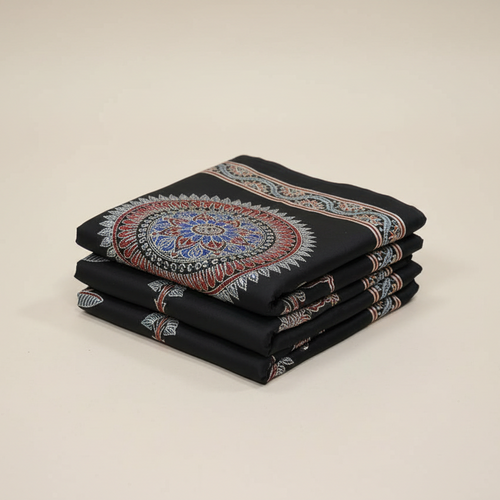 Folded black ajrakh saree with handblock prints