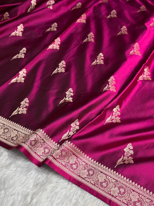 Purple fabric with gold floral patterns on a white background