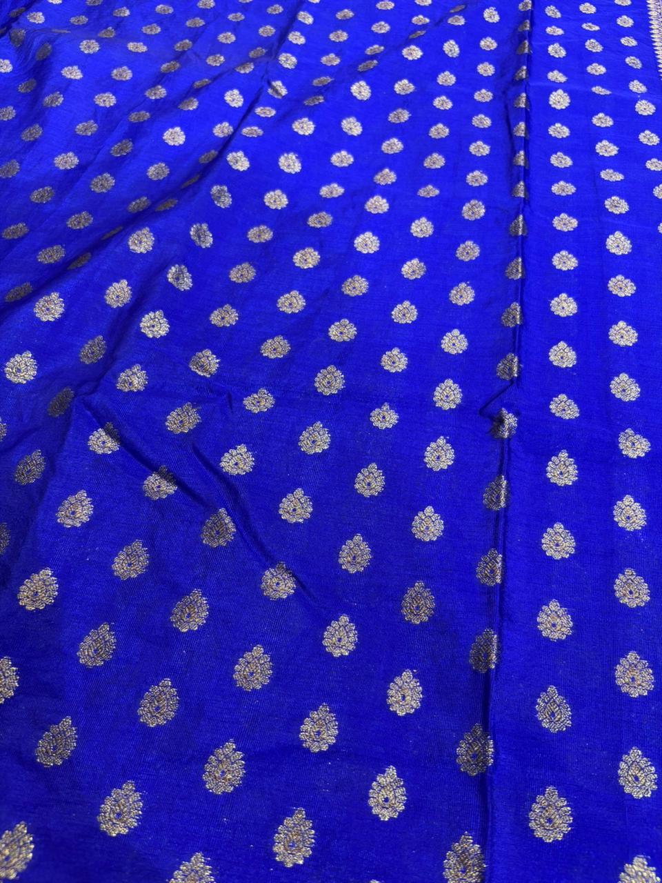 Blue fabric with silver floral patterns