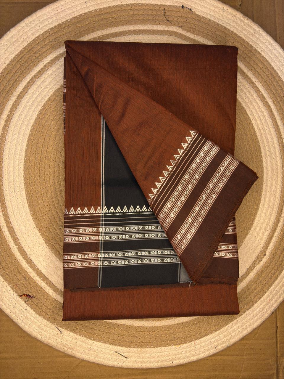 Brown fabric with geometric patterns on a circular woven mat