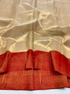 Chanderi saree with a red border on a white background