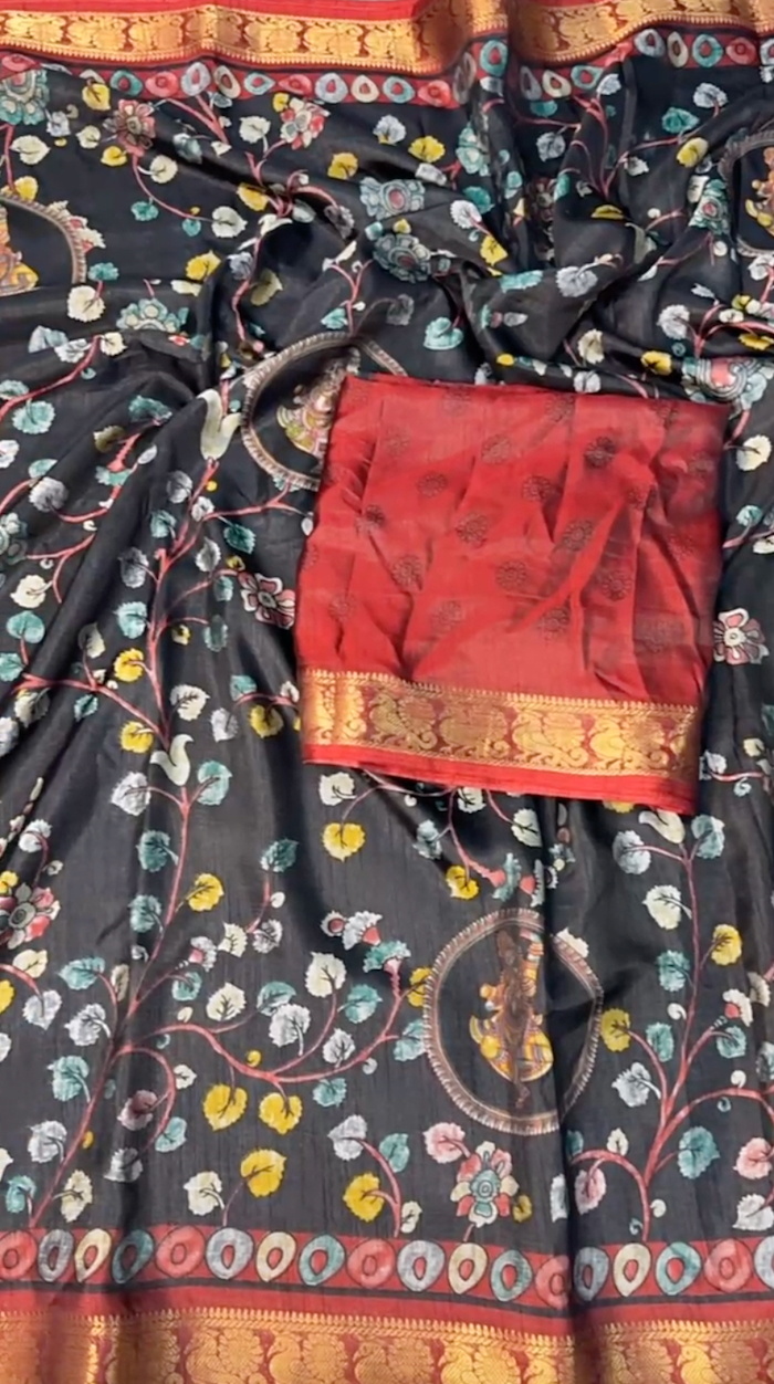 Traditional saree with a floral pattern and a red blouse with gold border.