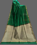 Green and beige saree with a plain background