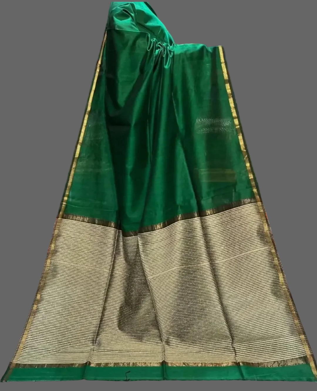 Green and beige saree with a plain background