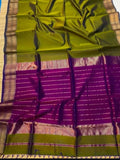 Saree with green and purple patterns on a checkered background