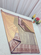 Decorative saree with intricate patterns on a white surface