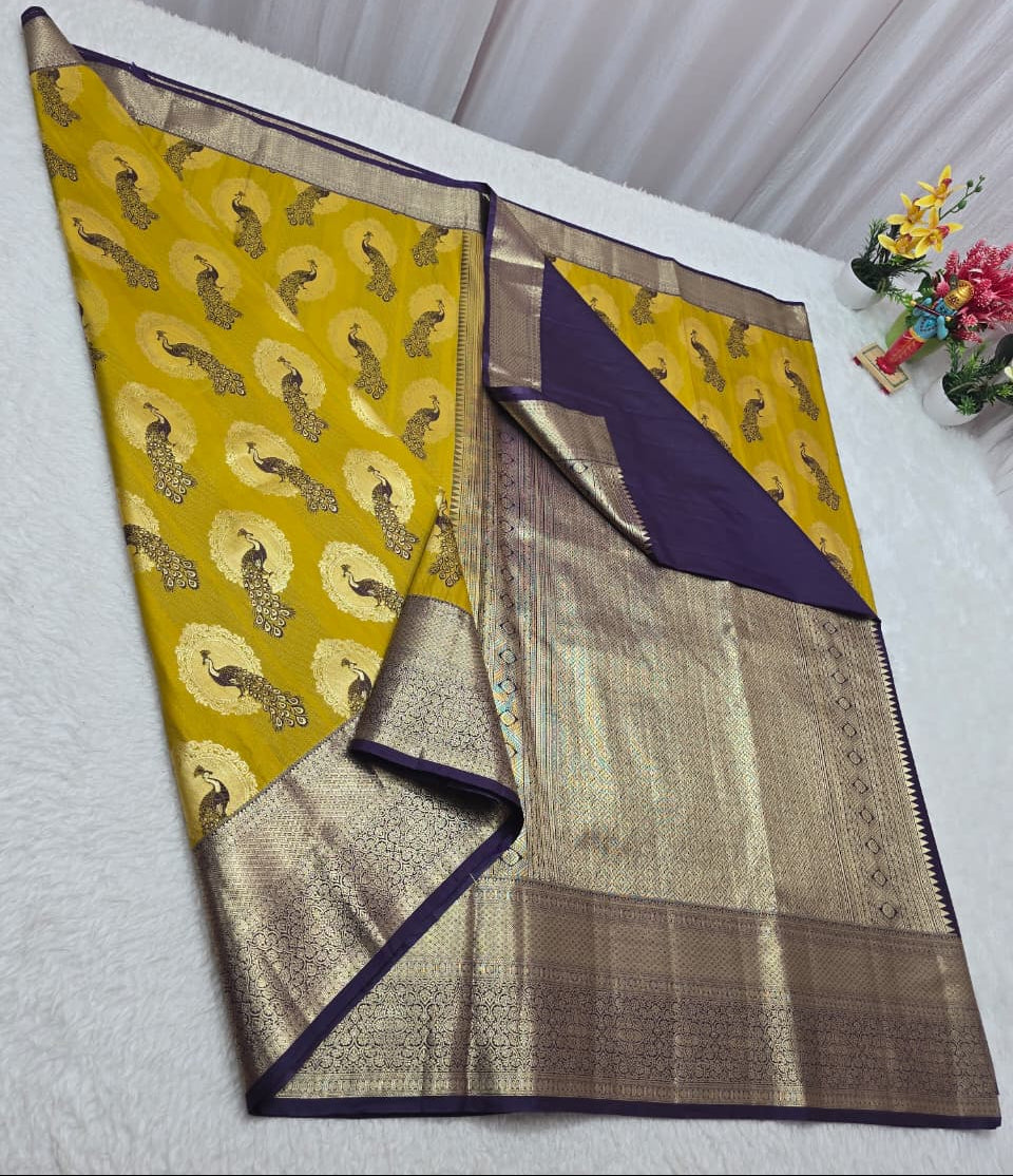 Saree with yellow and purple border on a white background