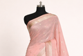Pink kota silk saree draped to a mannequin