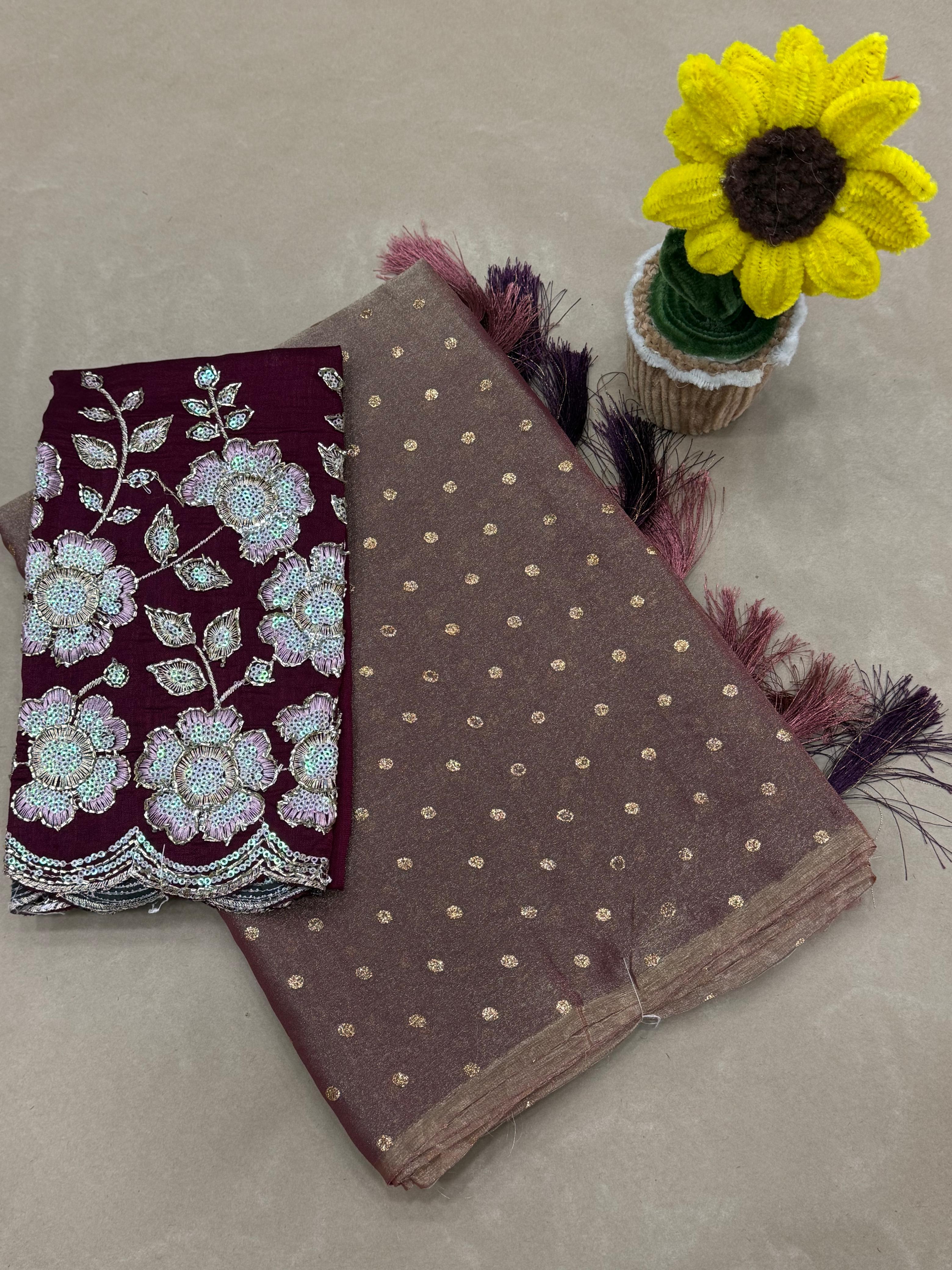 Two scarves, one with floral embroidery and the other with polka dots, on a neutral background.