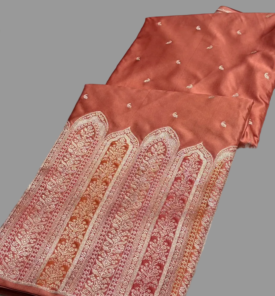 Decorative fabric with intricate patterns on a white surface