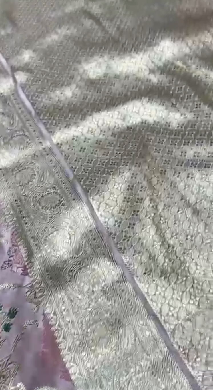 Close-up of a textured fabric with intricate patterns