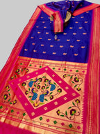 Colorful saree with intricate patterns on a plain background