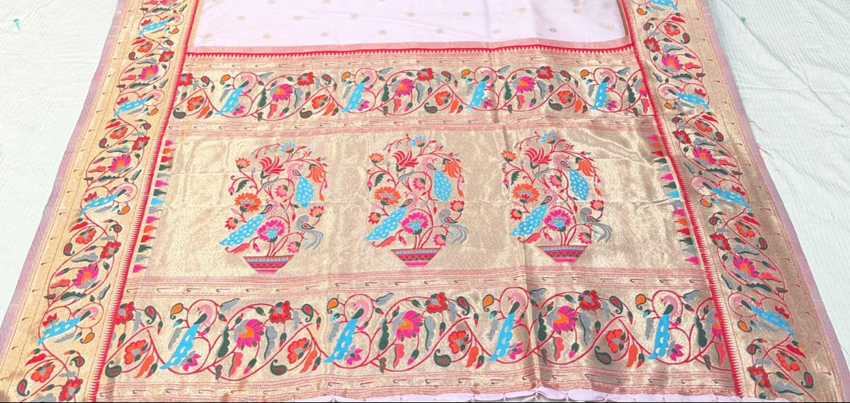 Decorative saree with colorful patterns in a store setting