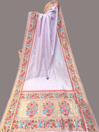 Decorative saree with colorful patterns in a store setting