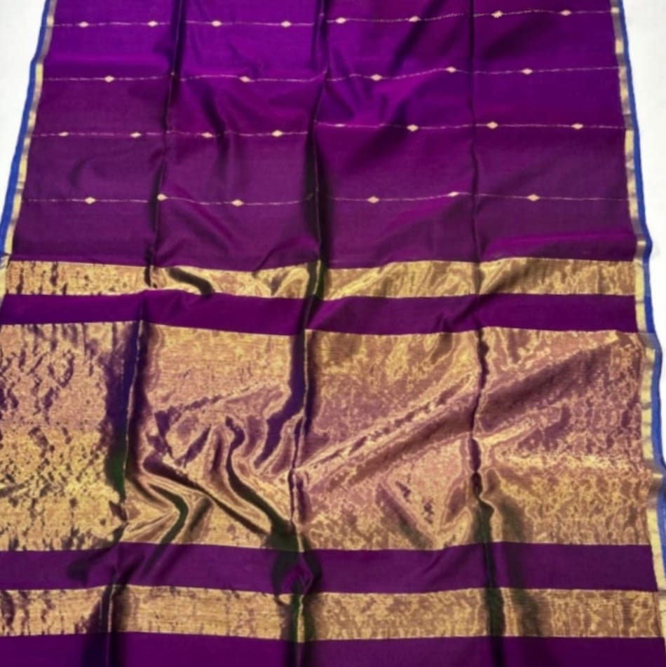 Purple and gold fabric with a striped pattern on a white background