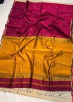 Saree with a red and gold pattern on a white background