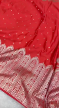 Red fabric with white floral patterns