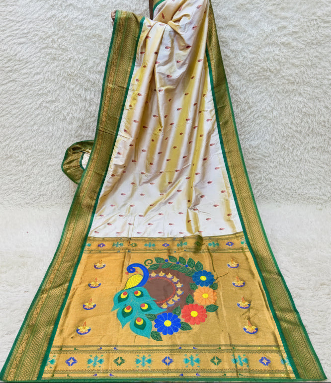 Saree with peacock design in a store setting
