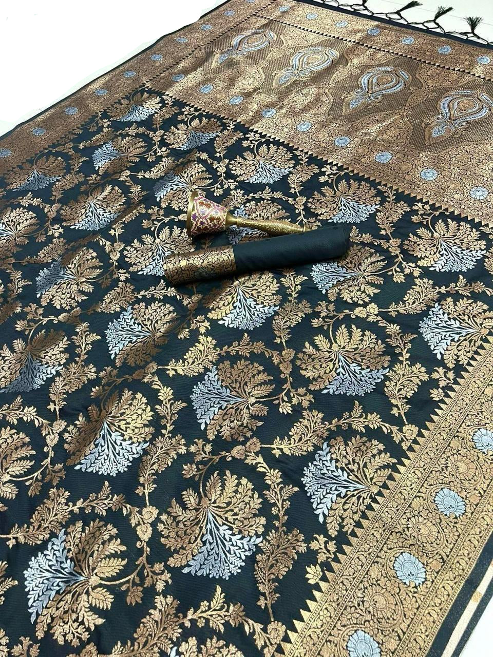 Decorative fabric with intricate patterns and a decorative item on top