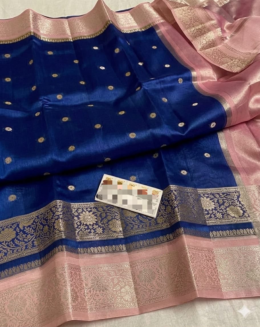 A blue and pink Banarasi silk saree with gold zari brocade borders and motifs, displayed flat with a matching pink dupatta.