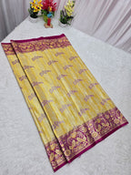 Yellow saree with purple border on a white background