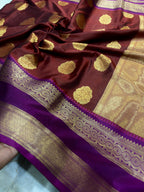 Brown and purple saree with gold patterns