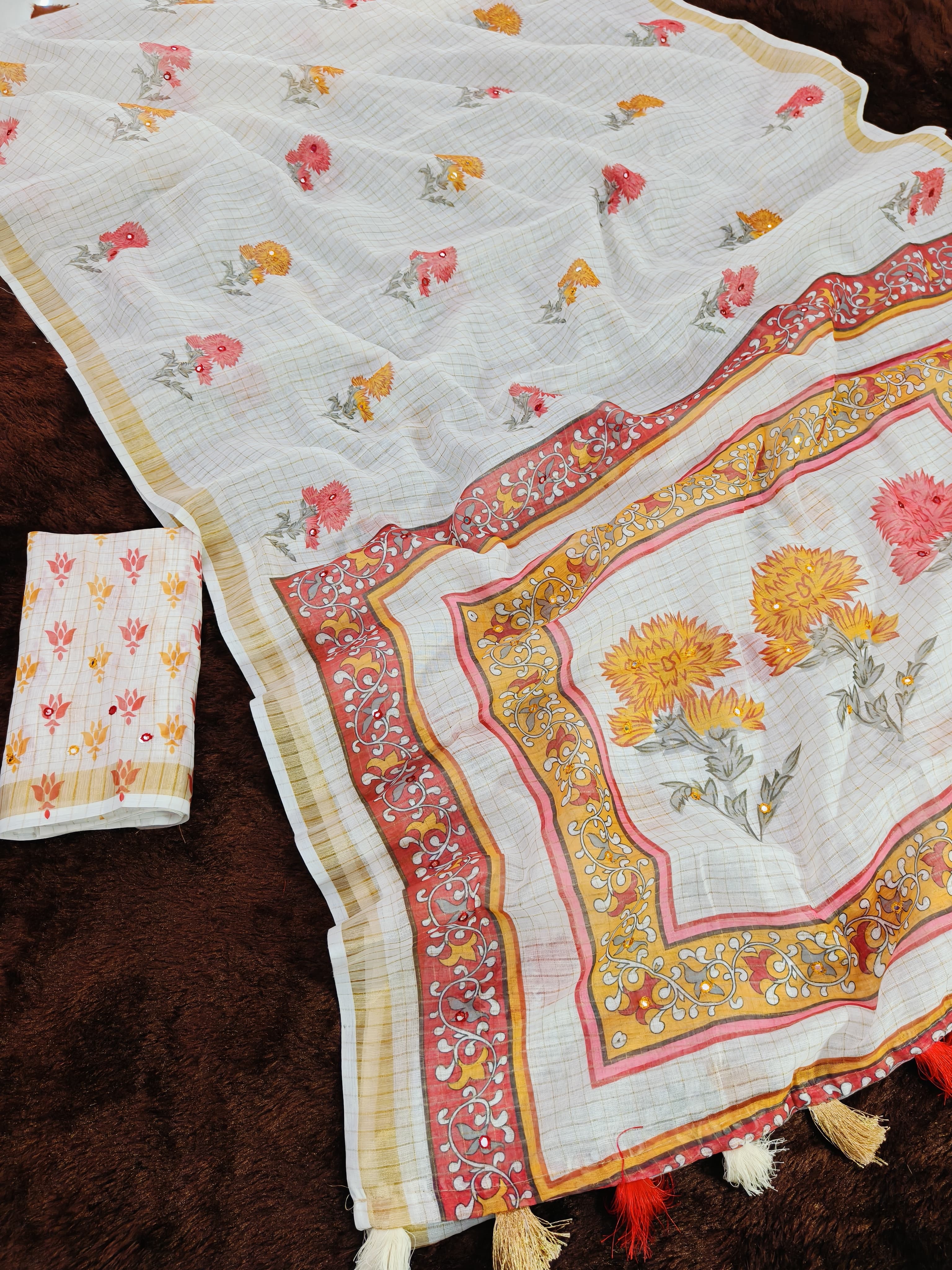 Decorative tablecloth with floral patterns on a dark surface