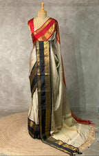 Saree with a geometric pattern on a mannequin against a gray background
