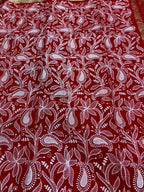 Red fabric with white floral pattern