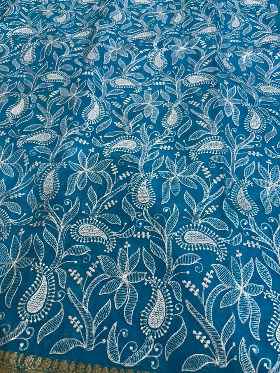 Blue fabric with white floral pattern