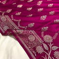 Purple fabric with white floral patterns