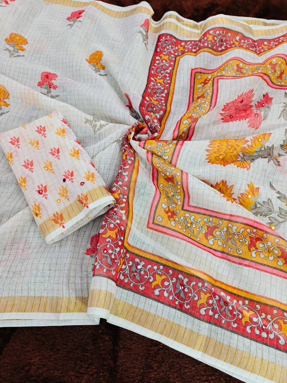 Set of patterned fabric pieces on a wooden surface