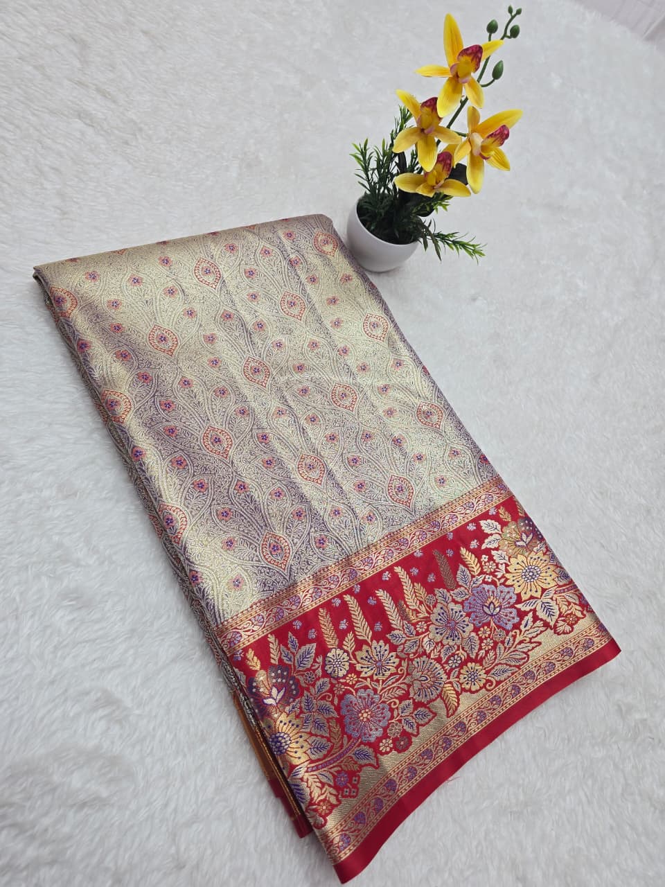 Decorative fabric with floral patterns on a white surface