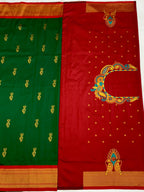 Green and red saree with gold embroidery on a white background