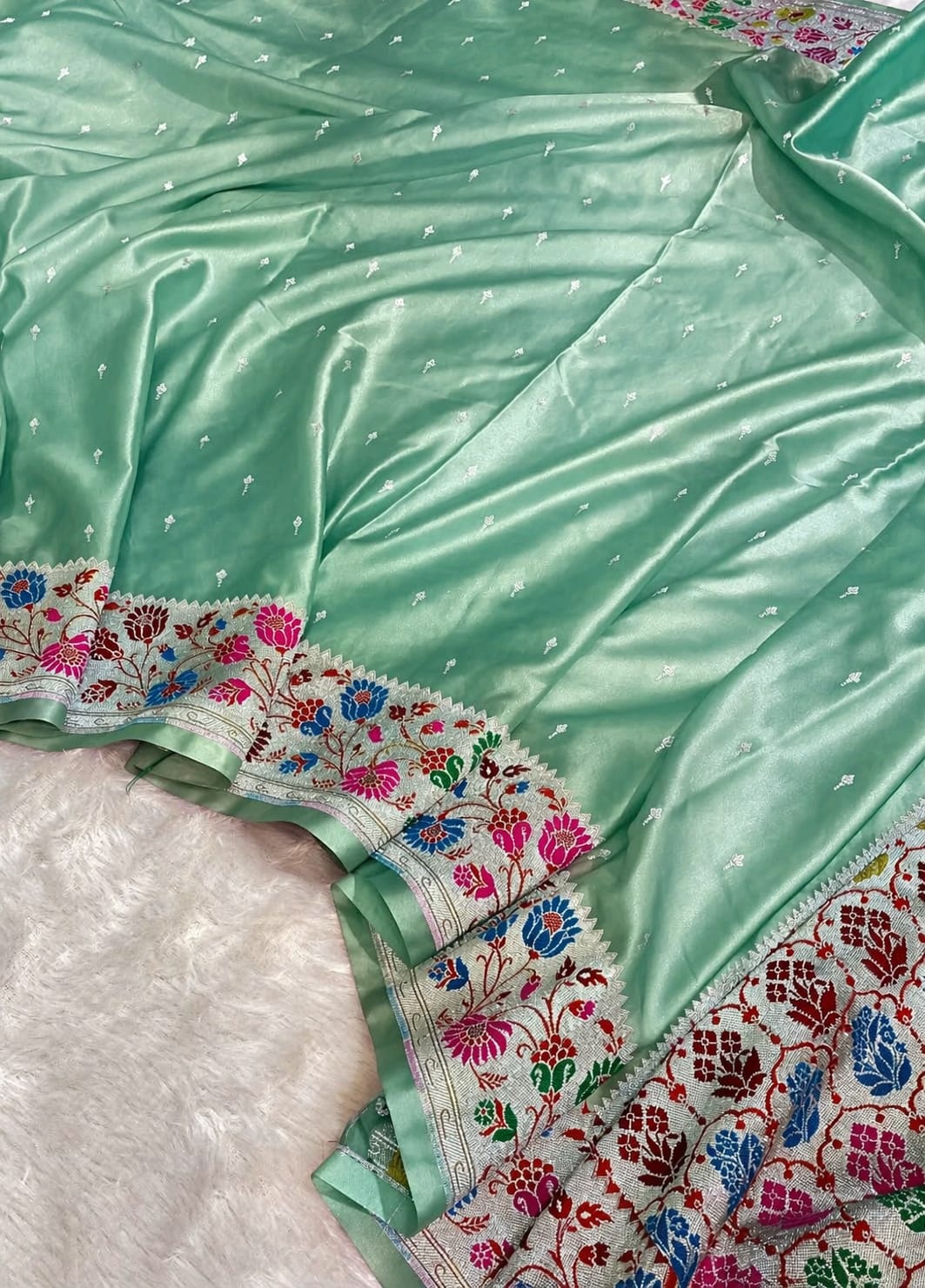 Light green fabric with colorful floral border