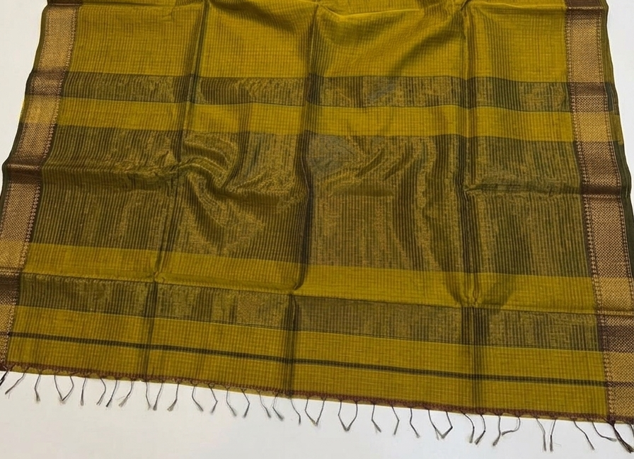 Yellow and brown checkered fabric with a plain background