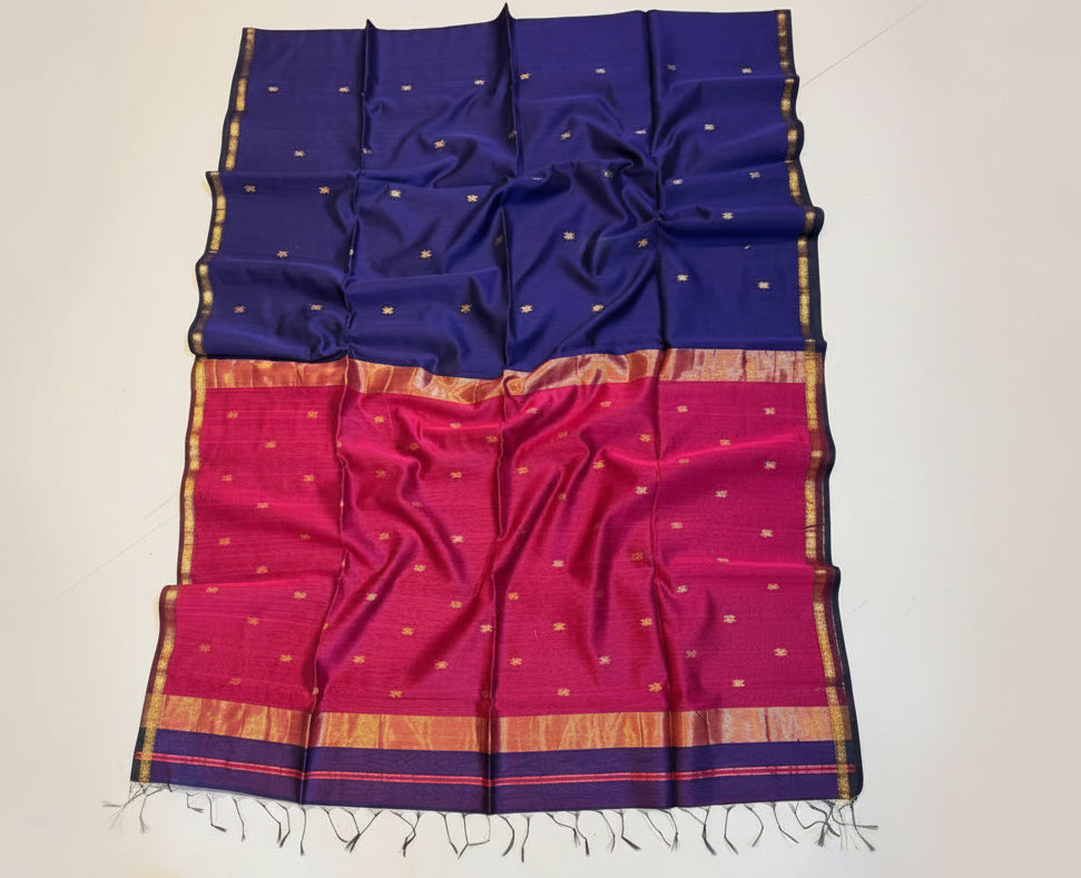 Blue and pink saree with a decorative border on a white background