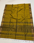 Yellow and brown checkered fabric with a plain background