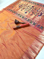 Traditional saree with intricate patterns on a plain background