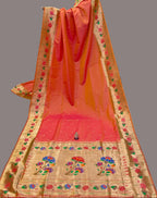 Orange saree with floral patterns on a white background