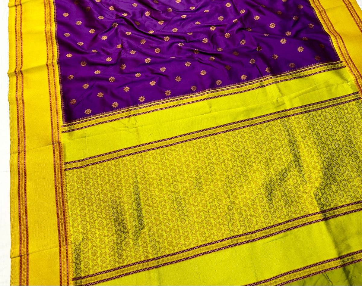 Purple saree with yellow border on a white background