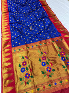 Saree with blue and gold patterns on a white background